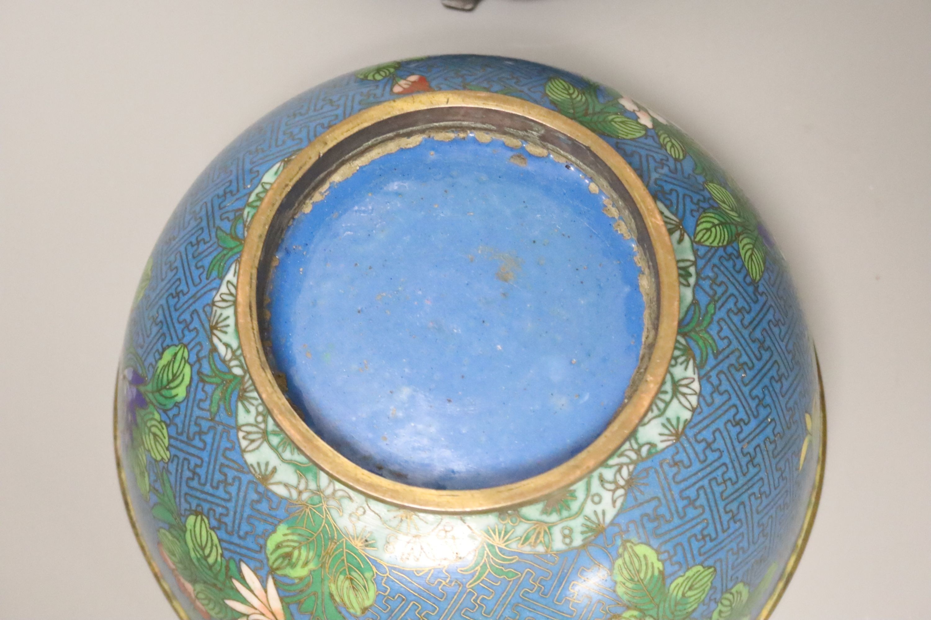 An early 20th century Chinese cloisonne enamel bowl, wood stand 20cm